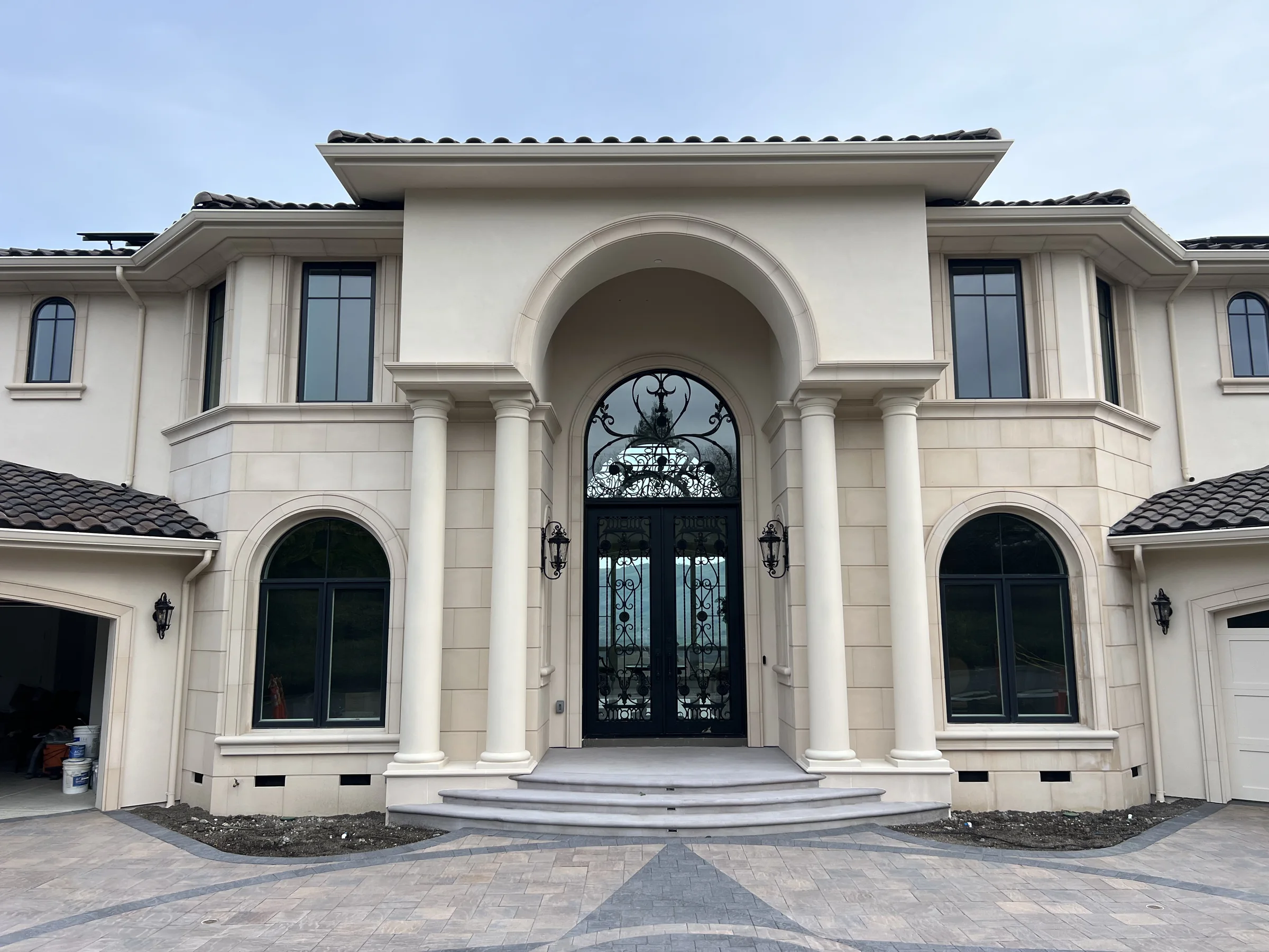 Grand entrance built with precast columns, mouldings, and surrounds
