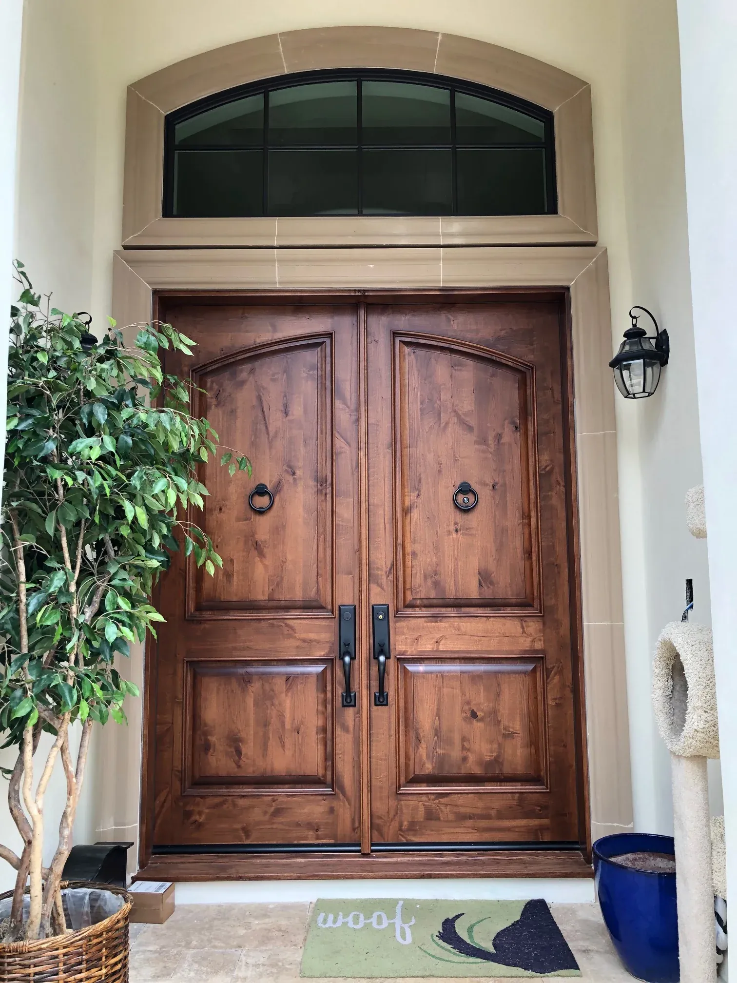 Moulded surround framing a timber entry door
