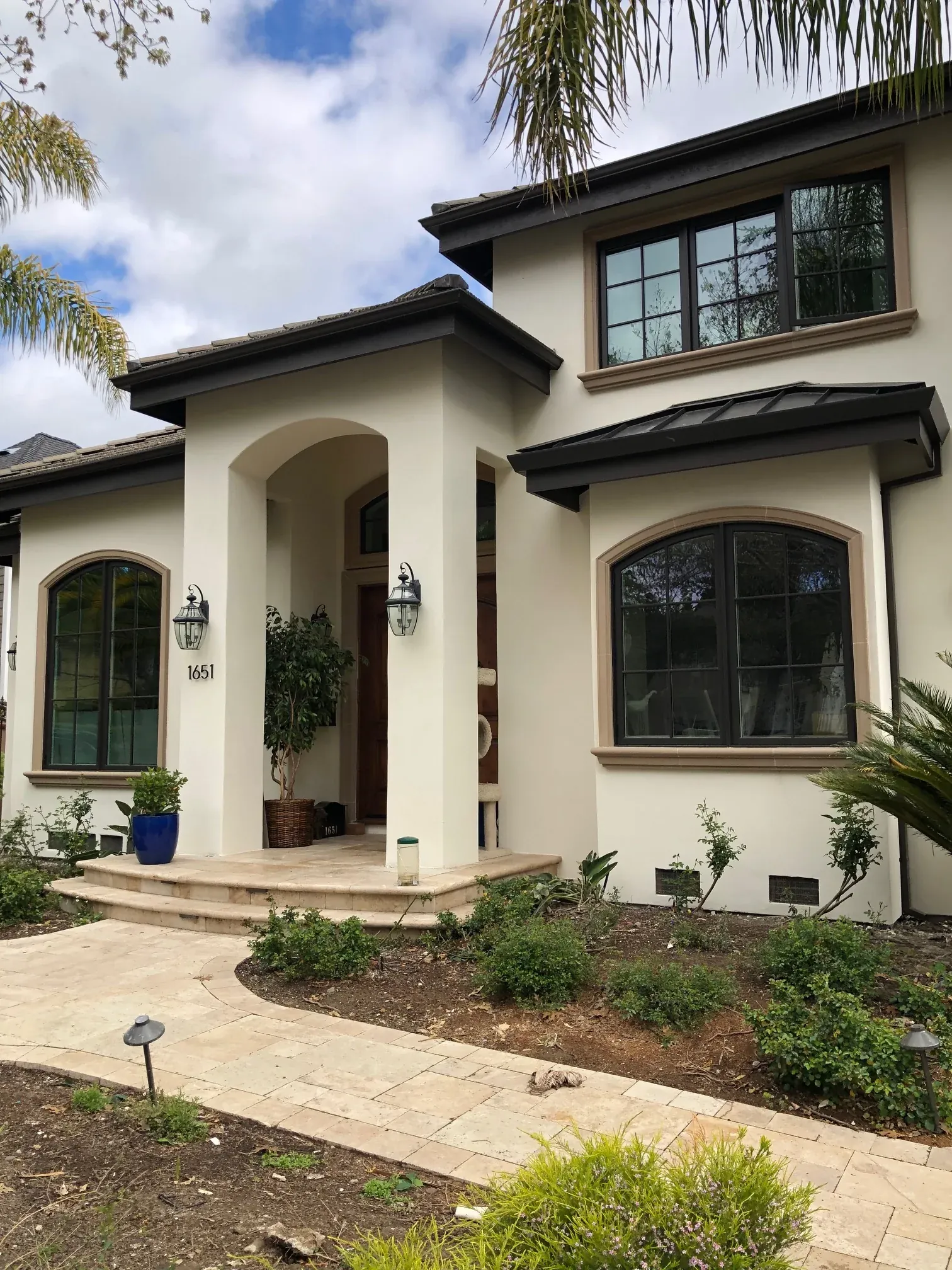 Lightweight profiles coordinated across the front of a residence