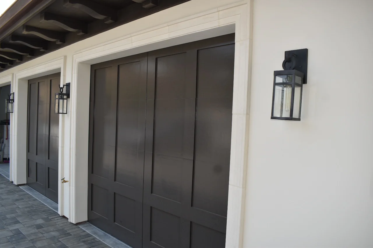 Straight moulded surrounds around garage doors