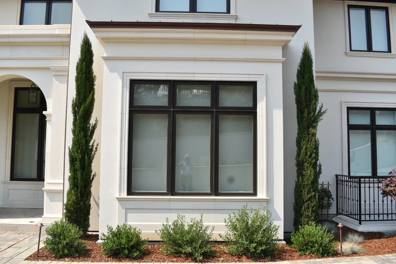 Window group with a coordinated sill, jambs, and header