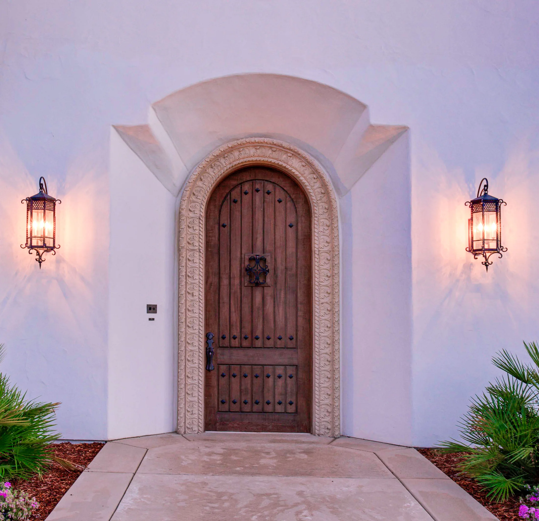 Cast stone moulding framing a residential entry