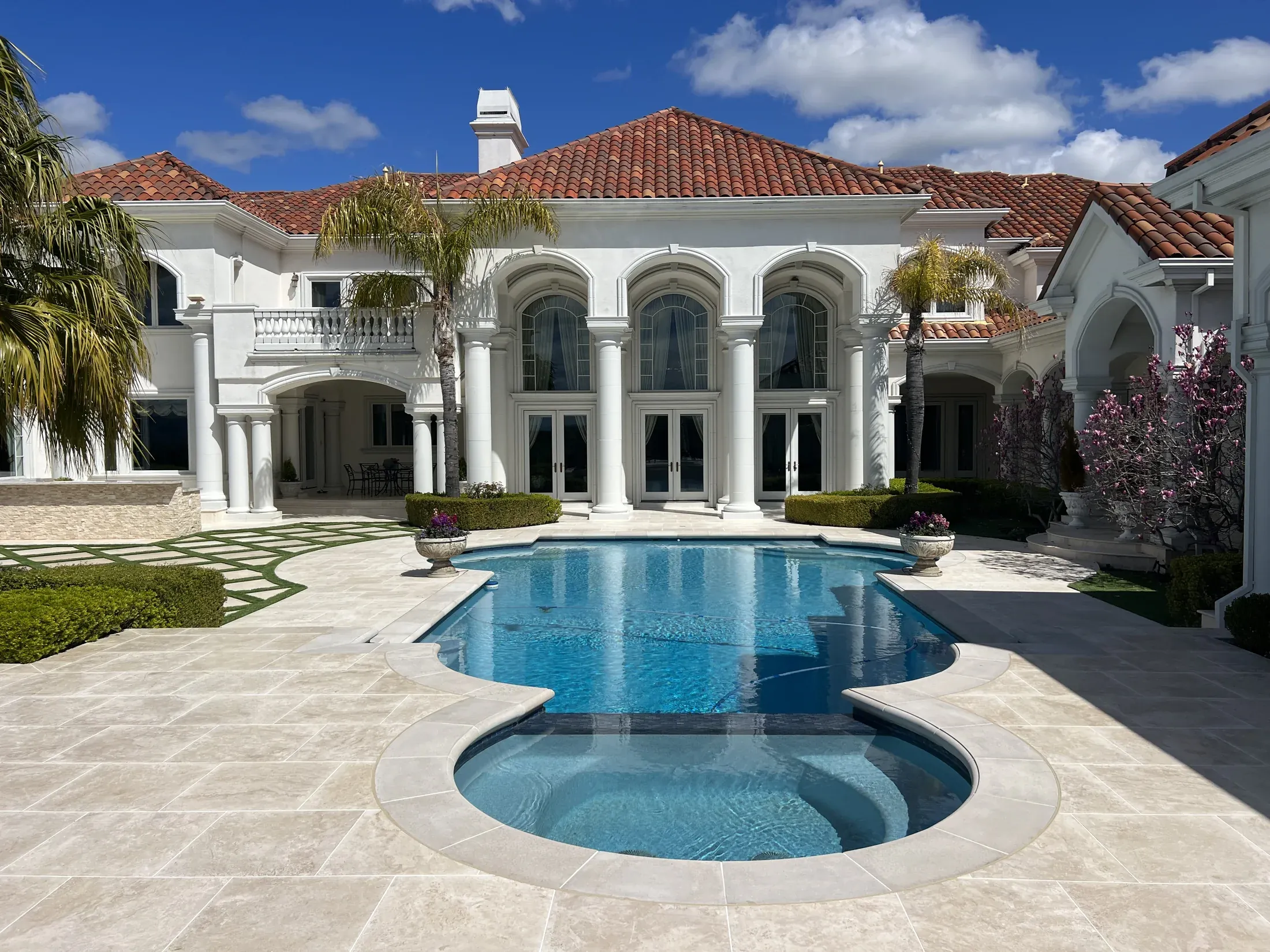 Stone paving surrounding a swimming pool