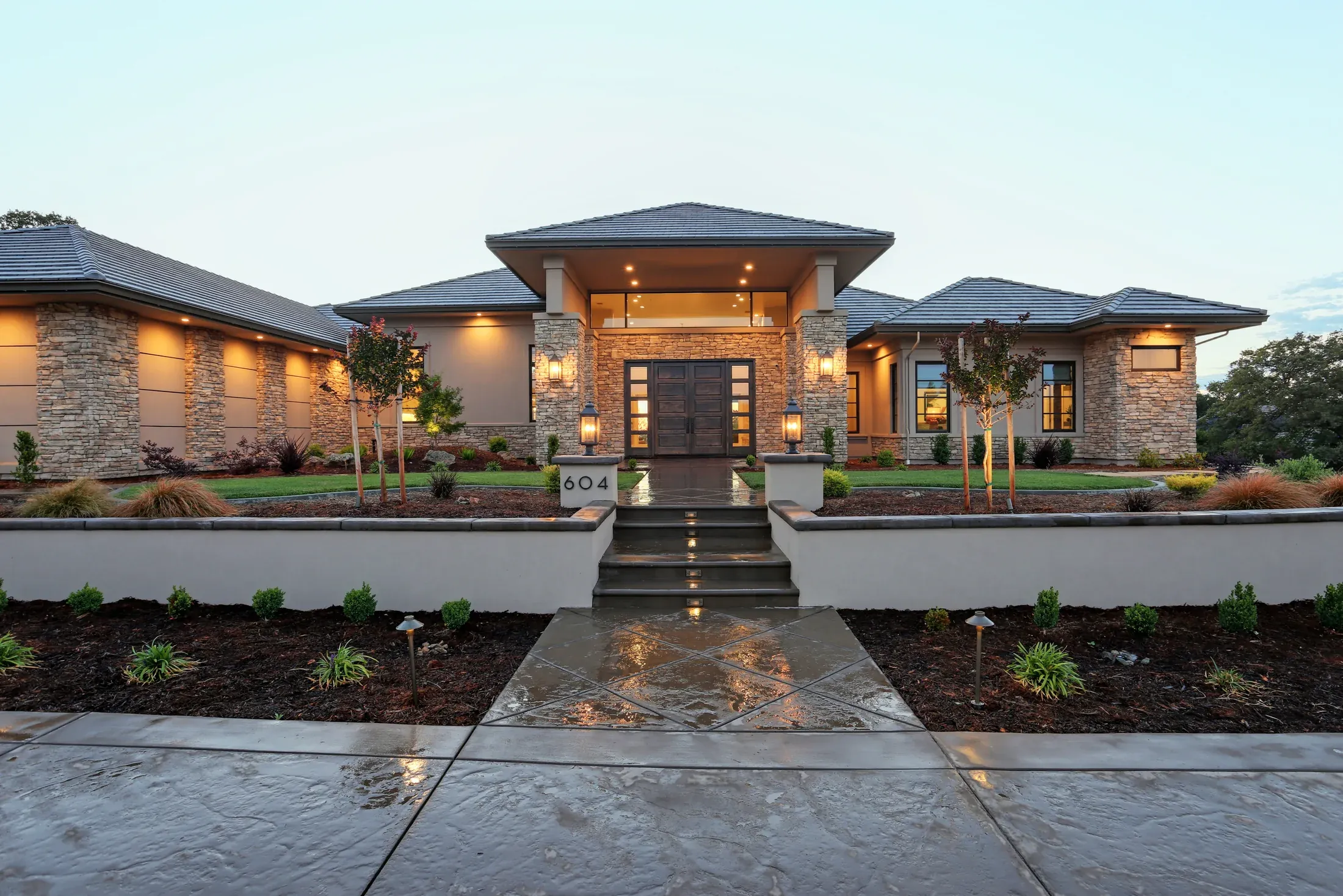 Residential entry court with cast and natural stone
