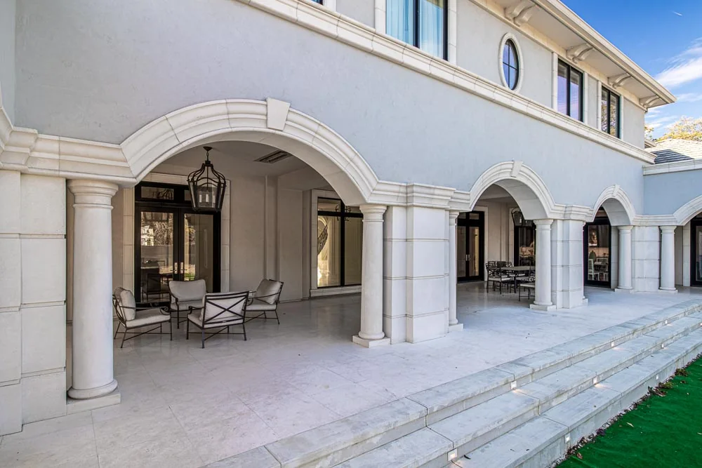 Covered residential arcade with cast stone columns